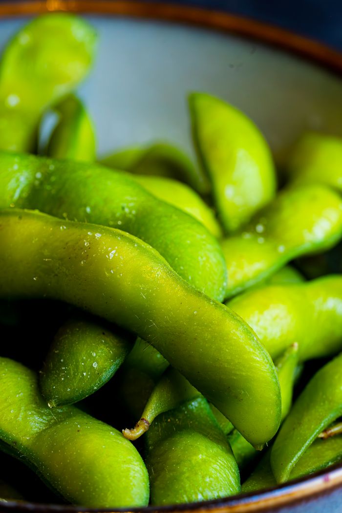 Vibrant green edamame beans in a bowl for healthy snacking.